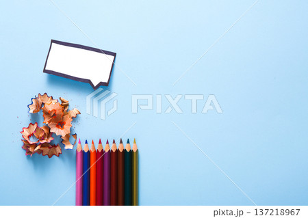 Creative ideas concept. Blank speech bubble and color pencil, flat lay, top view, copy space for text Creative ideas concept. Blank speech bubble and color pencil, flat lay, top view, copy space for text 137218967