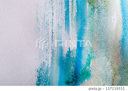 Watercolor paint brush strokes background. Abstract color spots on white paper texture, top view, copy space 137219551