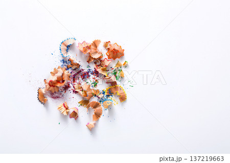 Wooden colored pencil sharpening shavings pile on white isolated background, top view, flat lay, copy space 137219663