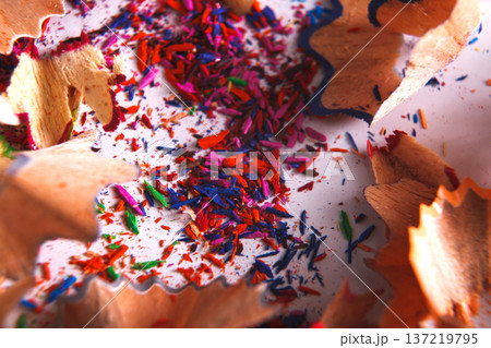 Wooden colorful pencil sharpening shavings closeup as abstract background. Art and education Wooden colorful pencil sharpening shavings closeup as abstract background. Art and education 137219795
