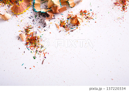 Wooden colorful pencil sharpening shavings, on white isolated background, top view, flat lay, copy space Wooden colorful pencil sharpening shavings, on white isolated background, top view, flat lay, copy space 137220334