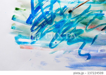 Watercolor paint brush strokes background. Blue color spots and lines on white paper texture. Abstract contemporary art canvas, top view 137224509