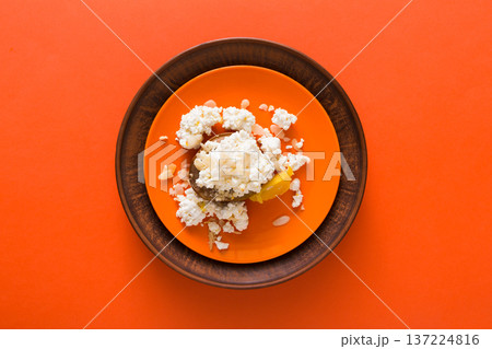 Healthy breakfast, dieting and detox concept - fresh cottage cheese on plate on bright background. Still life, flat lay, top view, copy space 137224816