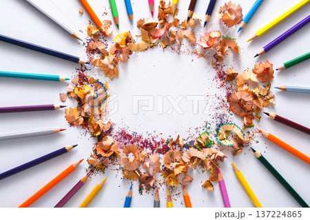 Drawing tools, lot of colorful pencils in circle with sawdust and shavings on white isolated background, copy space, flat lay Drawing tools, lot of colorful pencils in circle with sawdust and shavings on white isolated background, copy space, flat lay 137224865