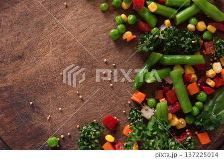 Healthy food, vegetarian nutrition. Organic vegetable mix on wooden table, close-up. Diet eating Healthy food, vegetarian nutrition. Organic vegetable mix on wooden table, close-up. Diet eating 137225014