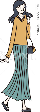 春の装いで外出する女性のイラスト　緑のスカート 137229830