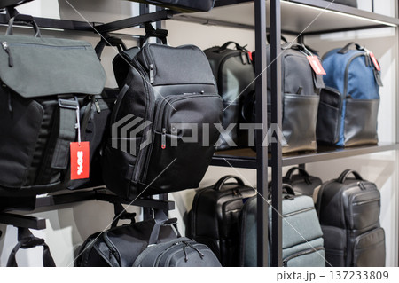 Wide selection of backpacks in store. Find the perfect backpack for you. Simple accessory with variety of features and designs. Huge variety of backpacks to suit every taste 137233809