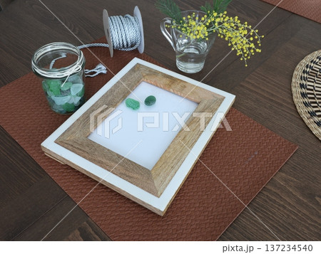 Framed sea glass. Creating art from natural materials. Hobbies and creativity. Recycling, nature, and ecology. 137234540