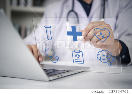 Doctor hand pointing virtual medical icons hologram screen laptop. Digital healthcare technology interface futuristic artificial intelligence analysis concept smart hospital medicine innovation. Doctor hand pointing virtual medical icons hologram screen laptop. Digital healthcare technology interface futuristic artificial intelligence analysis concept smart hospital medicine innovation. 137234761