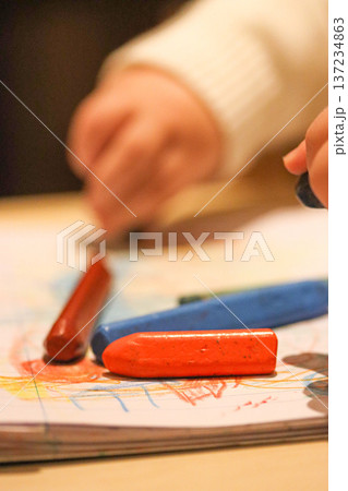 Young Artist Experimenting With Colors. Child Engaging With Artistic Coloring Activities Indoors 137234863