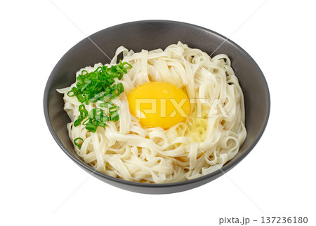 Udon noodles with raw egg and green onion isolated on white background with clipping path Udon noodles with raw egg and green onion isolated on white background with clipping path 137236180