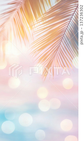 Palm tree leaves with bokeh lights, perfect for tropical holiday background 137236302