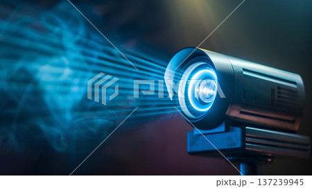 front view of a projector projecting a light beam on a dark background. the projector is on the right side, and the beam of light appears from it 137239945