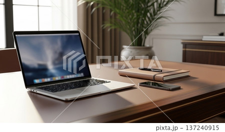 木製デスク上の携帯型計算機と業務資料表示画面の室内風景 137240915