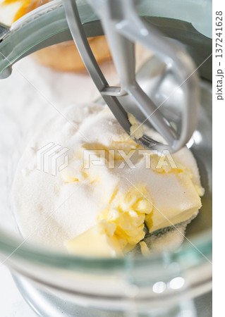 Mixer bowl with butter and sugar, ready to be combined in preparation for making Pale Gingerbread Cookies. Early steps in the recipe. Mixer bowl with butter and sugar, ready to be combined in preparation for making Pale Gingerbread Cookies. Early steps in the recipe. 137241628