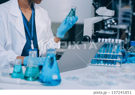Researchers working in the clinical laboratory Researchers working in the clinical laboratory 137241851