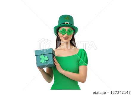 Woman in green outfit holding a gift box, isolated, PNG Woman in green outfit holding a gift box, isolated, PNG 137242147