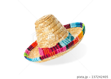 A sombrero hat with bright colors sits on a surface, isolated, PNG A sombrero hat with bright colors sits on a surface, isolated, PNG 137242405