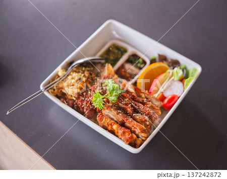 Grilled Teriyaki Chicken Rice Bowl with Fresh Salad 137242872