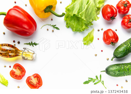 Fresh organic vegetables and olive oil creating a healthy food border 137243438