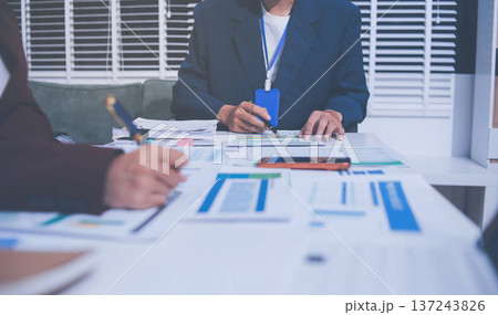Accounting company provide finance and taxation planning for profitable cash flow, Auditor and accountant team working in office, analyze financial data and accounting record with calculator 137243826