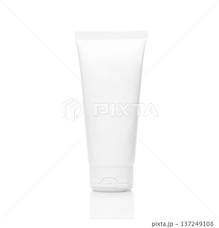 Blank white plastic tube containing cosmetic cream, lotion, or skincare product standing upright on a reflective white background, ready for brand design and advertising mockup Blank white plastic tube containing cosmetic cream, lotion, or skincare product standing upright on a reflective white background, ready for brand design and advertising mockup 137249108