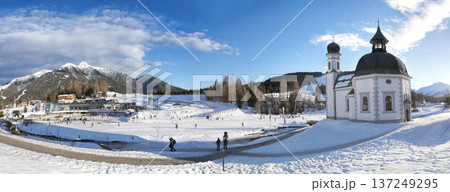 Winter panorama of Seefeld village with the church at sunset in in the Tyrolean Alps, Austria 137249295