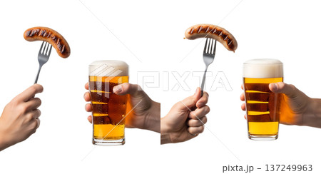 Hand holding a cold beer alongside a grilled sausage speared on a fork, representing cookouts, game day food, and casual dining 137249963
