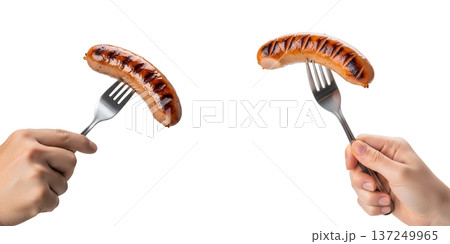 Hand holding grilled sausage on fork, isolated. Perfect for barbecue season, hot dog stands, and outdoor cooking themes 137249965