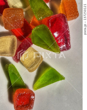 Close-up of colorful candies. Colorful jelly candies. Marmalade. Candied fruit. Close-up of colorful candies. Colorful jelly candies. Marmalade. Candied fruit. 137250121