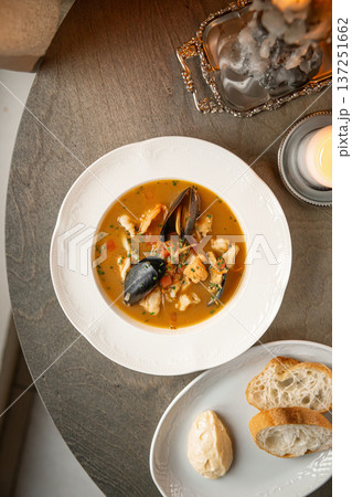 Marseille seafood soup with bread and butter 137251662
