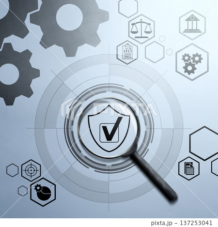 A conceptual image featuring a magnifying glass focused on a shield with a checkmark, surrounded by icons of gears, scales, and business charts, representing auditing, and security verification A conceptual image featuring a magnifying glass focused on a shield with a checkmark, surrounded by icons of gears, scales, and business charts, representing auditing, and security verification 137253041