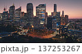 Australia, Sydney: Amazing Sydney's skyline cityscape at dusk, illuminated skyscrapers buildings, flowing night traffic, cars driving road, streets and iconic Sydney Tower. Aerial drone flight Australia, Sydney: Amazing Sydney's skyline cityscape at dusk, illuminated skyscrapers buildings, flowing night traffic, cars driving road, streets and iconic Sydney Tower. Aerial drone flight 137253267
