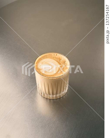 Barista crafted latte featuring detailed heartshaped foam art Barista crafted latte featuring detailed heartshaped foam art 137254167