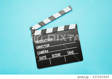 One movie clapper on blue background. Film industry One movie clapper on blue background. Film industry 137255507