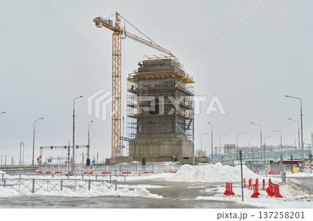 Restoration work on historic tower with safety measures in place Restoration work on historic tower with safety measures in place 137258201
