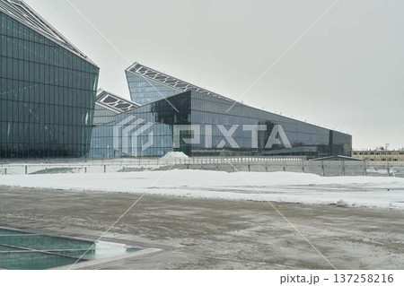 Spectacular glass innovation center with winter landscape surroundings 137258216