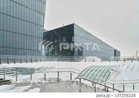 Corporate building surrounded by snow with minimalist architecture details 137258220