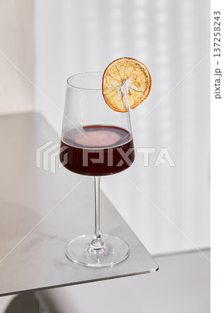 Highquality Studio Imagery Showcasing Decorated Wine Glass With Sharp Shadows And Sleek Style Highquality Studio Imagery Showcasing Decorated Wine Glass With Sharp Shadows And Sleek Style 137258243