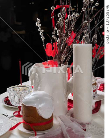 Chic display featuring willow branches and festive accents Chic display featuring willow branches and festive accents 137258246