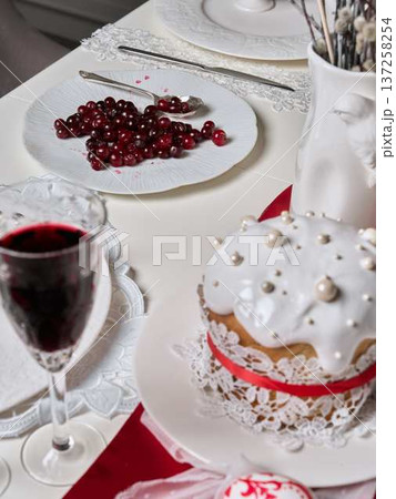Intimate celebration captured with decorative cake and fine glassware 137258254