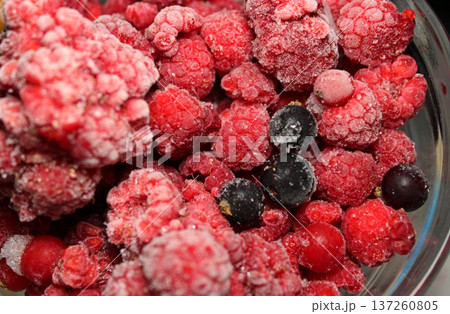 Whole Frozen Red And Black Berries In Defrosting Process At Normal Temperature Whole Frozen Red And Black Berries In Defrosting Process At Normal Temperature 137260805