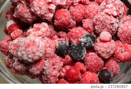 Detailed View Of Frozen Raspberry Fruits Mixed With Red And Black Currants Detailed View Of Frozen Raspberry Fruits Mixed With Red And Black Currants 137260807