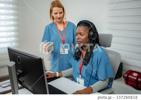 Nurses collaborating healthcare support online at call center 137260818