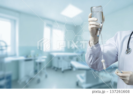 Nurse makes IV in clinic Nurse makes IV in clinic 137261608