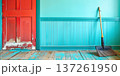 Brightly colored room with a broom against the wall in a home cleaning setting 137261950