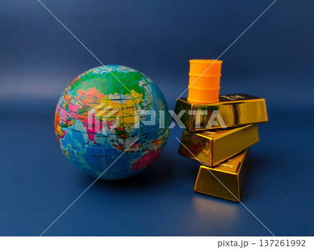 This image is a conceptual illustration representing the global economy, specifically highlighting the relationship between gold as a valuable asset and oil as a critical energy resource. This image is a conceptual illustration representing the global economy, specifically highlighting the relationship between gold as a valuable asset and oil as a critical energy resource. 137261992