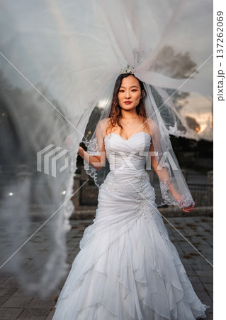 Chinese bride wearing wedding dress and veil for wedding 137262069