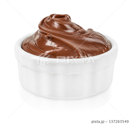 Creamy Chocolate Spread in White Ceramic Bowl Isolated on Light Background Creamy Chocolate Spread in White Ceramic Bowl Isolated on Light Background 137263549