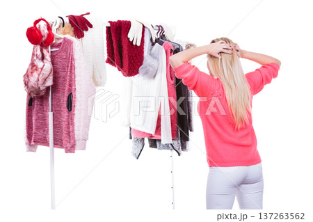 Woman in wardrobe choosing clothing 137263562